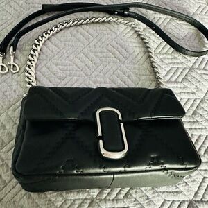 Marc Jacob’s like new crossbody quilted leather 10 in wide 5 in high 3 in depth